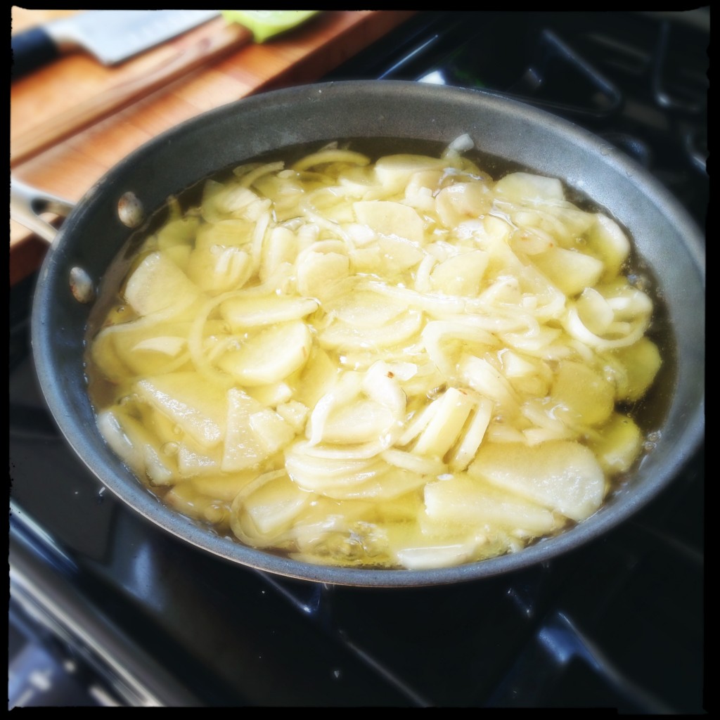 Gently cooking the potato and onion - almost a confit of potato.