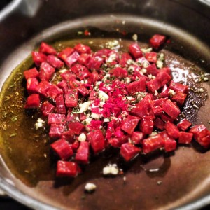 Cooking up chorizo, fennel seeds, garlic, rosemary, and chili