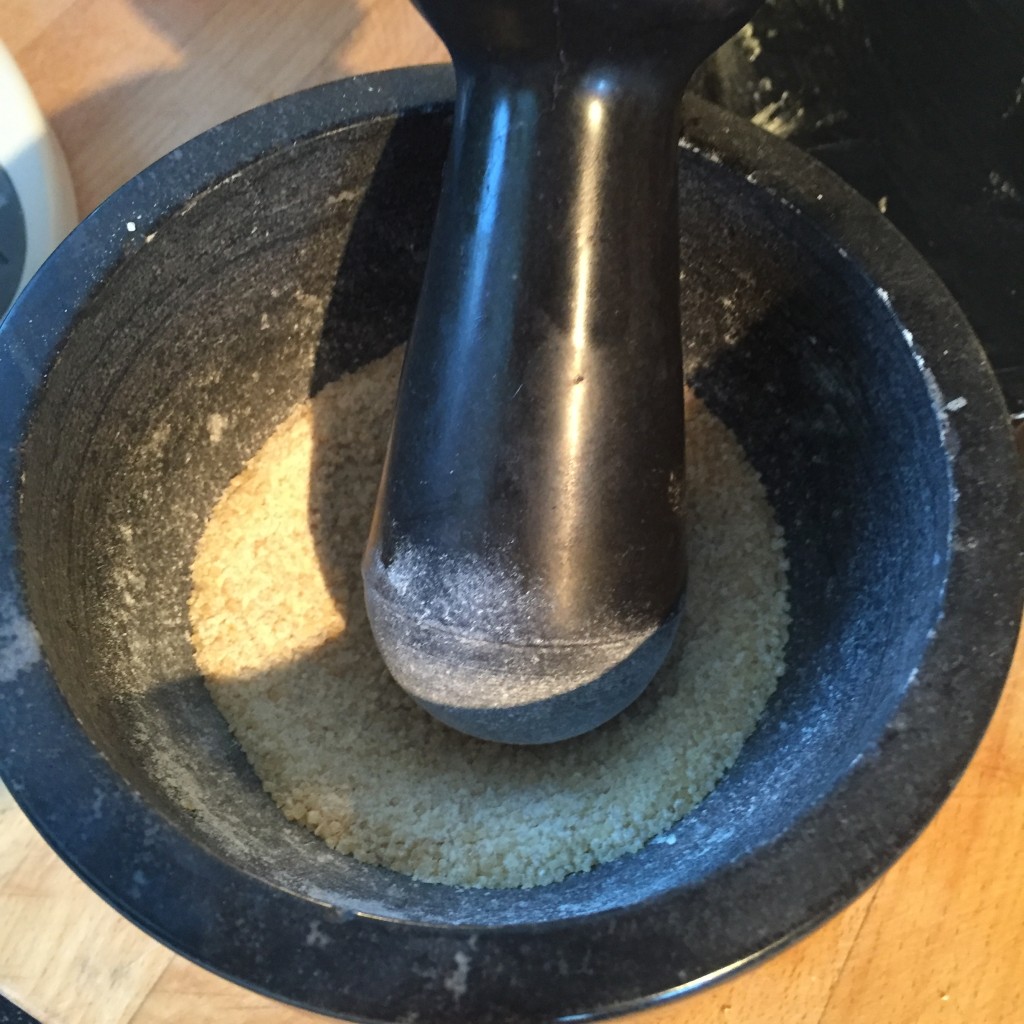 Crushing the demerara sugar up for the crust in the handy mortar and pestle. 